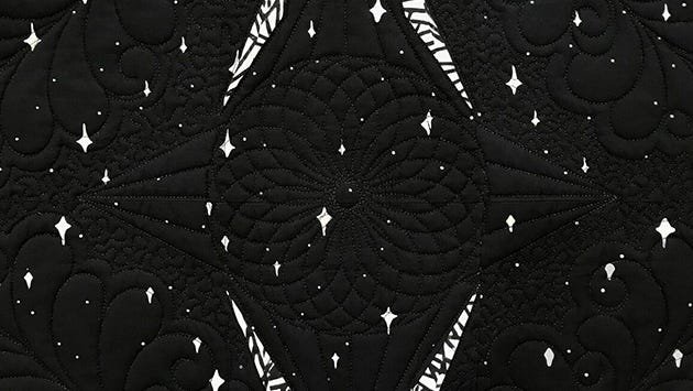 Quilting with black metallic thread