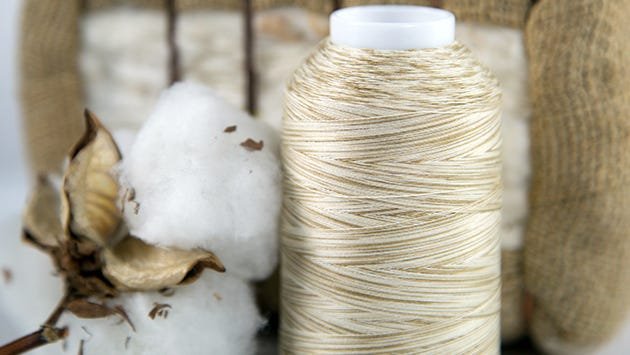 Cotton threads will naturally have a little bit of fuzz
