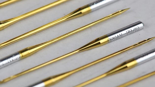 Superior's titanium-coated needles fit all home sewing machines