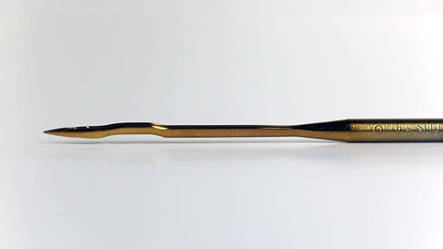 A titanium-coated Groz-Beckert longarm machine needle